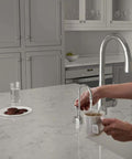 Velosah Instant Hot Water Dispenser Faucet With Gooseneck Spout Polished Chrome used for tea in modern kitchen