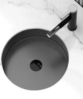 Top Notch Rust Resistant Stainless Steel Round Vessel Basin 15 6 Inch Slick Matte Black Finish with faucet on marble countertop