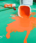 Orange paint spill on Pro Grade Heavy Duty Temporary Floor Protection Film For Construction And Renovation 39 Inch By 100 Foot Green Surface Shield For Hardwood Floors Tile And Painted Surfaces