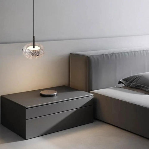 Resin Pendant Light, Gold 3 Color LED Hanging Fixture for Living Room above stylish nightstand in modern bedroom.