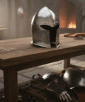 Medieval Barbuta Helmet With Liner for Larp, Cosplay, Halloween and Theatrical Props on workshop table