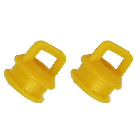 Close-up of two yellow bushings from Shifter Cable Bushing Repair Kit Ten Piece Replacement For OEM 11612155 And 14104 Fits 2007 2008 Chevrolet Silverado