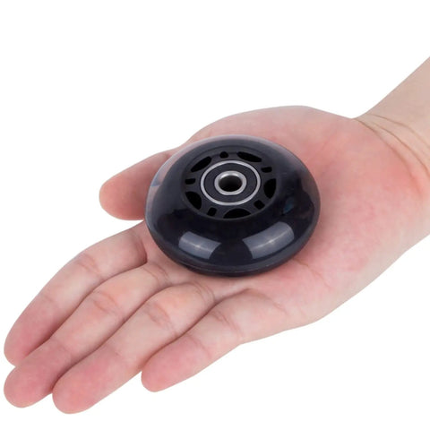 64mm Inline Skate Wheels 82A With ABEC 9 Beefy Bearings 4 Pack For Rollerblade And More shown in hand for size reference