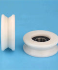 Grab This 10pc Set Of U Groove Plastic Coated Bearing 6202RS Pulley with POM Nylon Wrapped Design, showing U groove shape.