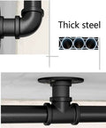 Industrial Water Pipe Stair Handrail Heavy Duty Wrought Iron Banister With Locking Brackets Straightforward Wall Mount showing thick steel fittings.