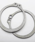 Close-up of External Retaining Ring Nine Sixteenths Inch Stainless Steel Pack Of 100 For Shafts 0.562 Inch Diameter Precision Groove