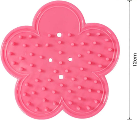 Pink plastic rose thorn remover from Rose Thorn Stripper Tool Kit for garden pruning, petal-shaped design, 12cm diameter.