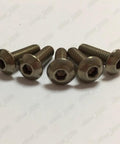 Hella Durable Grade 2 Titanium Button Head Screws With Hex Socket Drive Built Like A Tank For Medical Devices And Marine Rigging Saltwater Certified Precision Fasteners That Slap Onto Projects Effortlessly Massive 50 Piece Set Ready To Run displayed in a close-up stack.