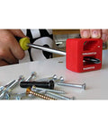 Person using red unit of Must Have Precision Demagnetizer And Magnetizer Tools Set Three Color Pack for screwdriver on screws