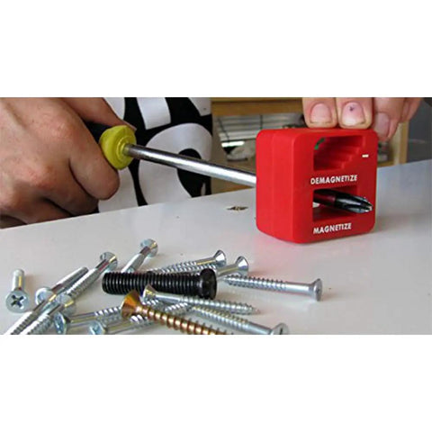 Person using red unit of Must Have Precision Demagnetizer And Magnetizer Tools Set Three Color Pack for screwdriver on screws