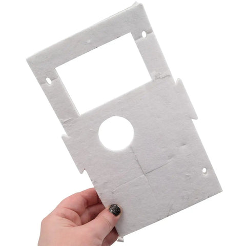 Natural Gas Water Heater Pilot Assembly Replacement Kit component, showing flat rectangular fiberboard piece with cutouts
