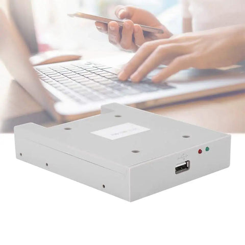 1.44MB USB Floppy Drive Emulator With 32-Bit CPU For Industrial Controls, High-Performance USB SSD Floppy Emulator, 34-Pin Interface, No-Fuss Plug And Play Installation, Secure Data Handling And Reliable Legacy Drive Simulation. White USB floppy emulator with front port and indicator lights