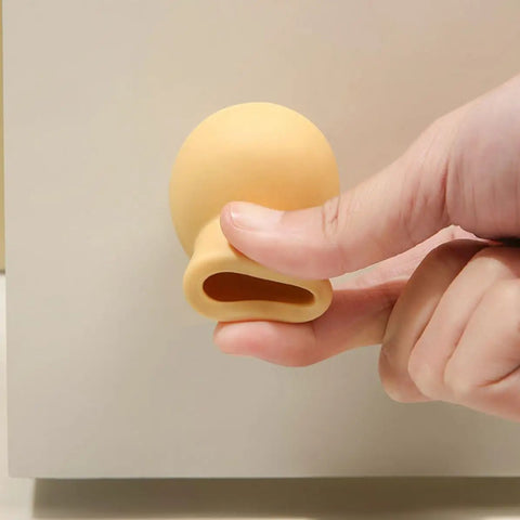 Wall Mounted Door Stopper Set Four Pack, Non Slip PP And TPR Material in use, showing anti collision feature on beige surface