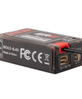 Close-up of ExpressLRS 2.4GHz 6 Channel PWM Receiver for FPV Drones, Airplanes, and Gliders showing connections and label