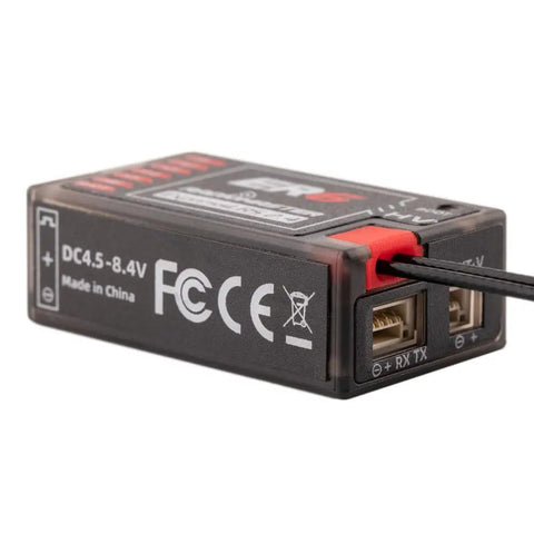 Close-up of ExpressLRS 2.4GHz 6 Channel PWM Receiver for FPV Drones, Airplanes, and Gliders showing connections and label