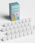 Kid Safe Outlet Covers 32 Pack With Hidden Pull Handle in white with box, child proof socket plugs displayed arranged neatly.