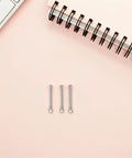 10 Sets Stainless Steel Folding Fan Rivets And Nuts Repair Kit For Paper Decorative And Dance Fans DIY Friendly Pro Grade Durable Fasteners For Quick Fixes And Smooth Operation And Long Lasting Performance, silver fan rivets on pink background