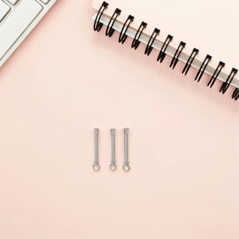 10 Sets Stainless Steel Folding Fan Rivets And Nuts Repair Kit For Paper Decorative And Dance Fans DIY Friendly Pro Grade Durable Fasteners For Quick Fixes And Smooth Operation And Long Lasting Performance, silver fan rivets on pink background