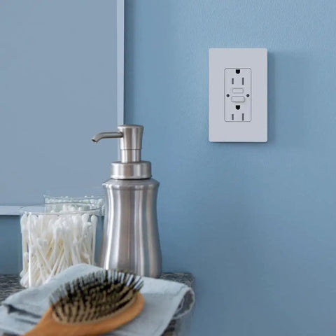 Tamper-Resistant 15 Amp GFCI Duplex Outlet In Biscuit Finish With Self-Checking Test And Reset Button Every 30 Seconds Coordinates With Decorator Style Dimmers And Switches Wall Plate Not Included in a bathroom setting with toiletries.