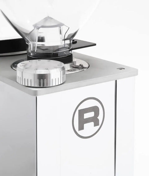 Premium Compact Home Espresso Maker Paired With Precision Burr Grinder Featuring Pid Temperature Lock For Hella Rich Extraction and Ready To Rock Convenience close-up of precision burr grinder top