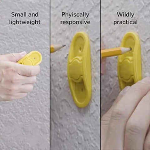 Person using the BSTiltion Magnetic Stud Finder, a small yellow tool, to mark a wall for mounting projects.
