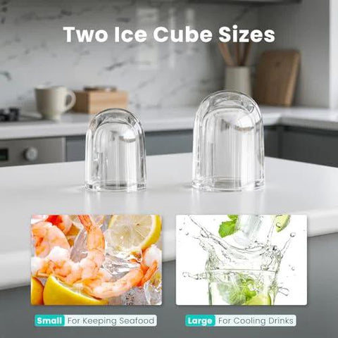 Ice cube molds, two clear dome-shaped plastic domes on a white kitchen counter.