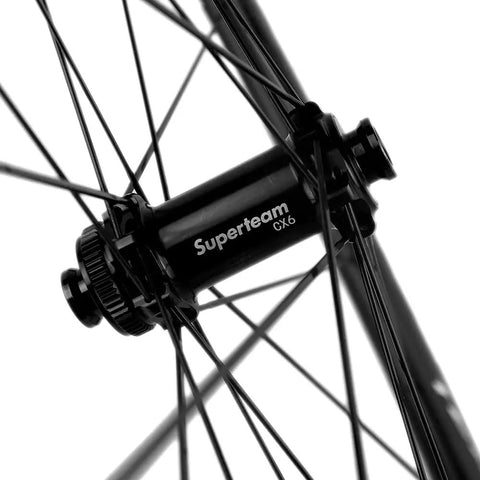 Close-up of hub on 45mm Carbon Tubeless Wheelset For Disc Brake Road Bikes With 25mm Inner Width No Paint Finish Tubeless Ready To Roll Shimano 8 9 10 11 Speed Cassette Body Compatible.