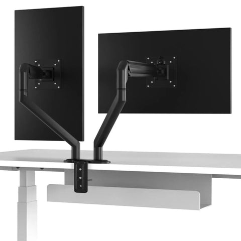 Hella Sturdy Dual Monitor Desk Mount With Super Simple No Drill Install For Thick Tables Rock Solid Clamps holding two monitors.