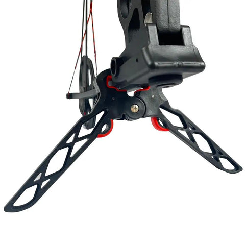 Close-up of Folding Archery Bow Stand For Compound Bows With Non Slip Grip showing base and limb clamp in outdoor setting.
