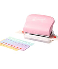 Pink adjustable 6 hole punch for diary planner and binder pages, 5.5mm round holes, with colorful punched sample paper