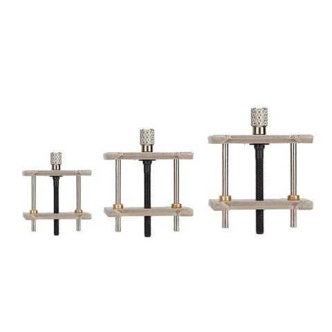 3 Piece Watch Repair Tool Set With Plastic Movement Holder For Adjusting And Disassembling Movements Handy Pro Grade Maintenance Kit For Watches Jewelry Making Hobby Crafts And More, showing three metal movement holders in varying sizes.