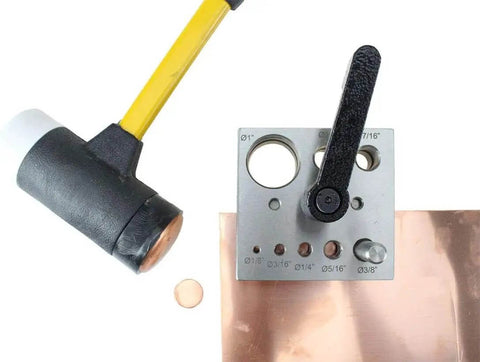 Eight Piece Disc Cutter Set For Heavy Duty Circle Cutting One Eighth To One Inch Punches in use with sheet metal and mallet