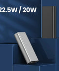 DIY Custom Polymer Battery Charging Case For Two 1260110 Cells Offering Hella Fast 22.5W PD Bidirectional Power Delivery With A Slick Led Digital Display Inside A Rock Solid Aluminum Alloy Frame And Multiple Usb Outputs. Dual-cell portable charger in silver and black, showcasing sleek design and output specs.