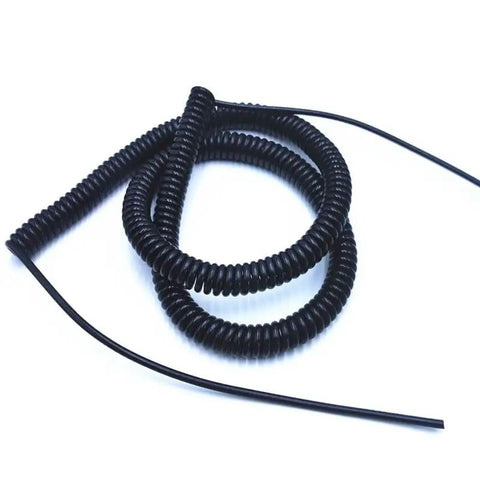 Heavy Duty Coiled Extension Cord That Snaps Back Quick Stretches Twelve Feet For Truck Beds And Workshops Delivers Reliable Three Core Power Without The Tangled Mess Or Annoying Slack On Busy Job Sites.