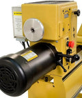 Powermatic 20x20 variable-speed woodworking lathe, yellow housing, side view.