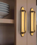 Antique Brass Zinc Alloy Cabinet Handle With Backplate 7.56 Inch Center To Center 192mm installed on wooden cabinet doors