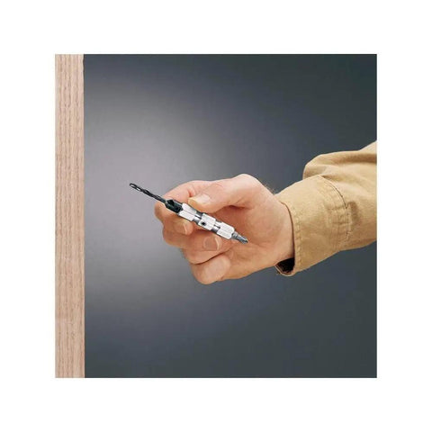 Hand holding Flip Drive Drill Driver Complete Unit For Number Eight Drill With Integrated Bit Holder Ergonomic Contoured Grip