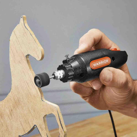 0.7 Amp Rotary Tool Kit With 80-Piece Accessory Set For Cutting Grinding Sanding Polishing Engraving And Drilling, An All-In-One DIY Power Tool That Covers Cutting Discs, Bits, Wheels, Brushes, Stones And More. Handheld rotary tool sanding a wooden horse cutout