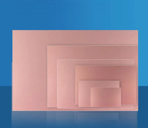 Stacked Eight Piece FR4 Copper Clad PCB Boards Set, 50mm X 70mm X 1.5mm, single-sided, displayed on blue background