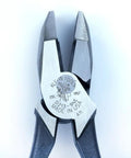 Close-up of 9 Inch High Leverage Linesman Pliers For Copper Aluminum And Soft Metals, Durable Made In USA Build, showing engraved branding.