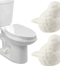 Slick White Ceramic Bird Toilet Bolt Covers Hiding Exposed Flange Nuts Zero Stress Install on a toilet.