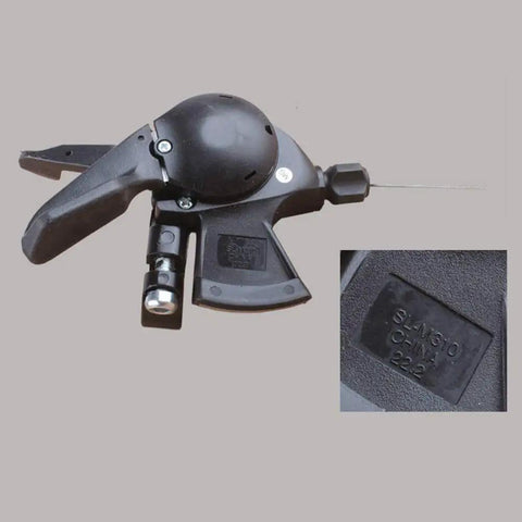 8 Speed MTB Trigger Right Shifter And Left Friction Ratcheting Thumb Shifter Pair For Triple Crank Mountain Bikes Aluminum and Plastic Build Compatible With Shimano Acera SL M310 Smooth Down And Up Shifts Solid Dope Replacement closeup.