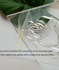 Clear Acrylic Cat Paw Router Template For Woodworking Solid 1/4 Inch Thick jig showing protective film to peel off.