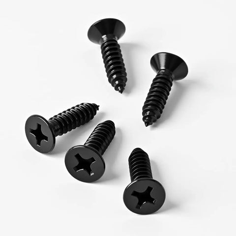 Rust Busting Number 4 Gauge Half Inch Flat Head Sheet Metal Screws With Phillips Drive And Self Tapping Threads Clad In Black Oxide 304 Stainless Steel For Badass Wood Or Metal Shop Jobs 100 Count laid out on a white background.