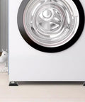 Front view of washing machine door with visible surrounding cabinetry and floor mat.