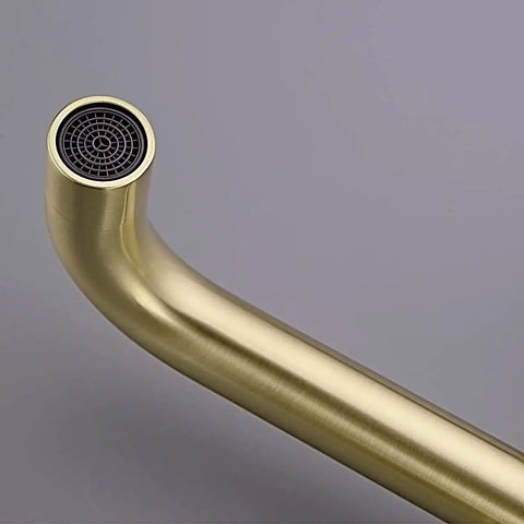 Close-up of Dope Brushed Gold Wall Mount Bathroom Faucet spout, showing durable solid brass construction and sleek design.
