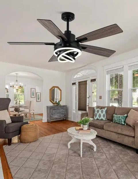 Smooth Operator 52 Inch Black Modern Chandelier Ceiling Fan Featuring Smart App Control And Barn Wood Blades in a cozy living room setting.