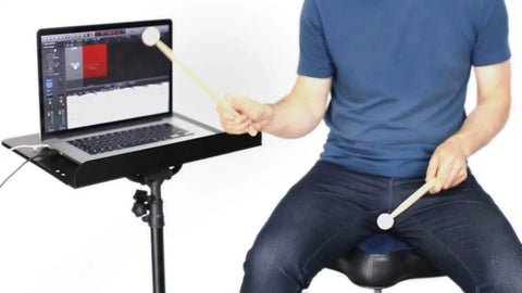 Man using Portable Air Drum Kit With Low Latency Camera For Real Drum Feel Quiet Practice Play Anytime Space Saving Electronic Drums