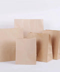 Kraft Paper Bags Khaki Bulk Pack Of 50 Or 100 Durable Gift Bags For Party Favs And Treats In 43x33x15 Cm Size Eco Friendly Reusable Bags For Events Weddings And Retail Use