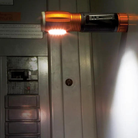 LED Flashlight And Work Light With Magnetic End on electrical panel, compact, durable and waterproof for hands free illumination